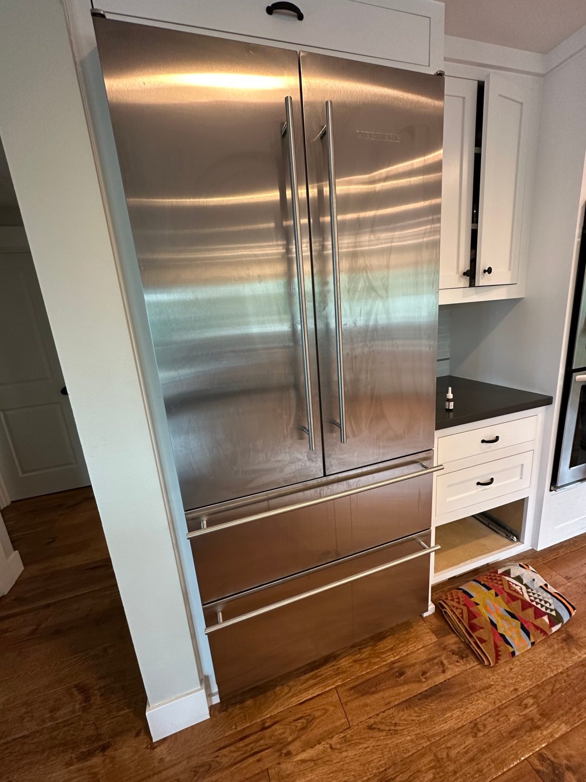 Stainless Liebherr CBS 2062 French-door refrigerator with two freezer drawers in a Seattle kitchen