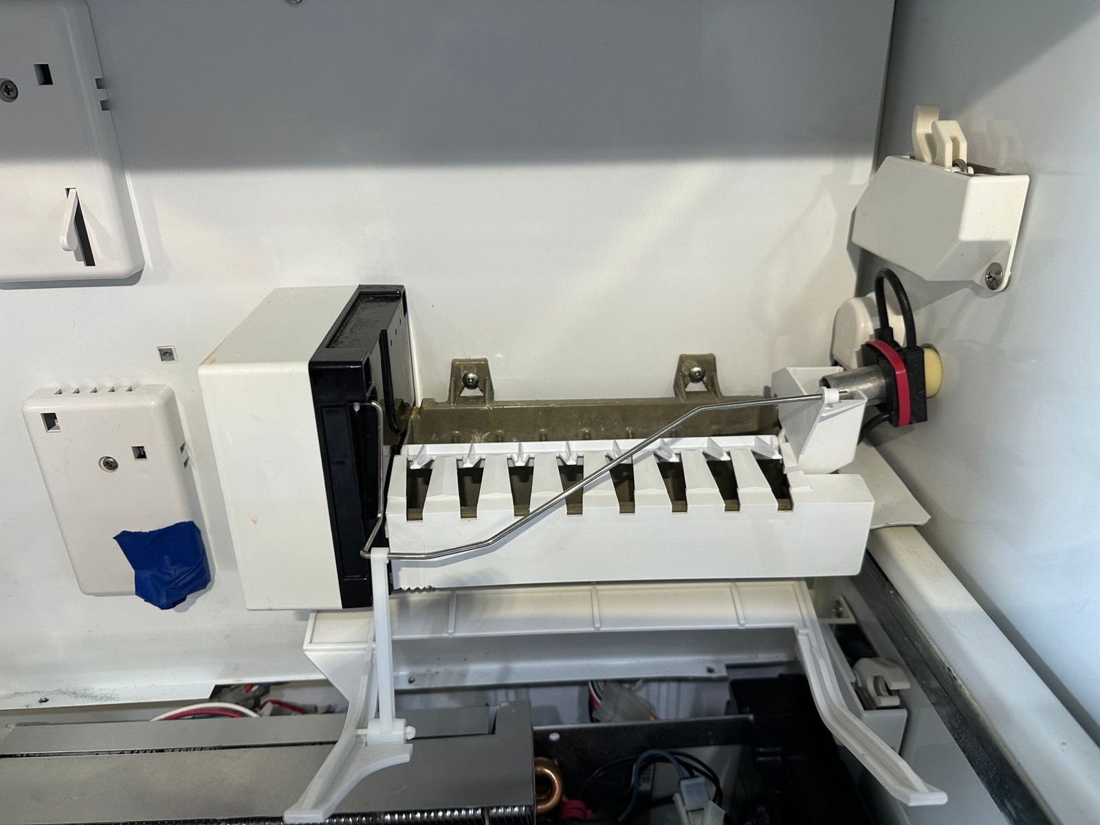 Ice maker reinstalled in the upper compartment of the Sub-Zero 700BFI freezer