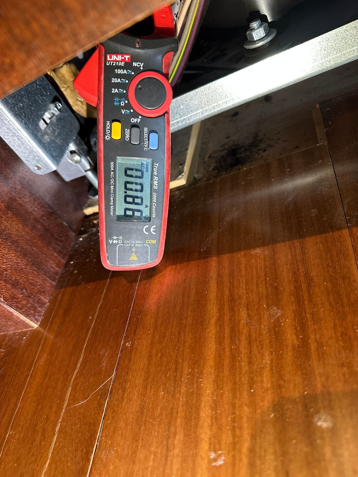 UNI-T clamp meter reading 0.86 amps on the Sub-Zero compressor circuit