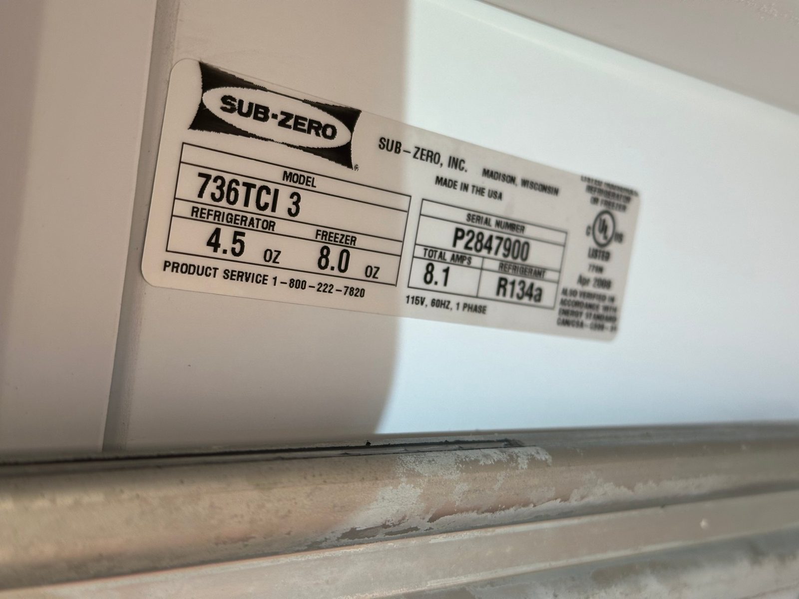 Sub-Zero data tag showing model 736TCI 3, R134a refrigerant, 4.5 oz refrigerator charge and 8.0 oz freezer charge