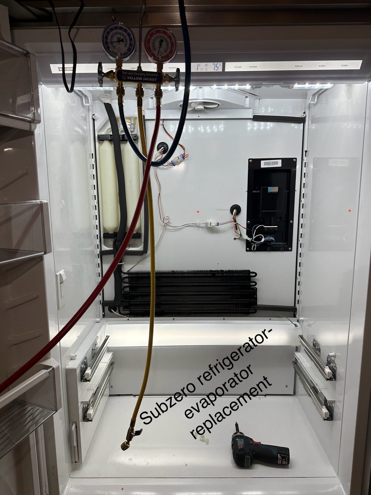 Sub-Zero refrigerator evaporator replacement, sealed system open with charging manifold gauges attached
