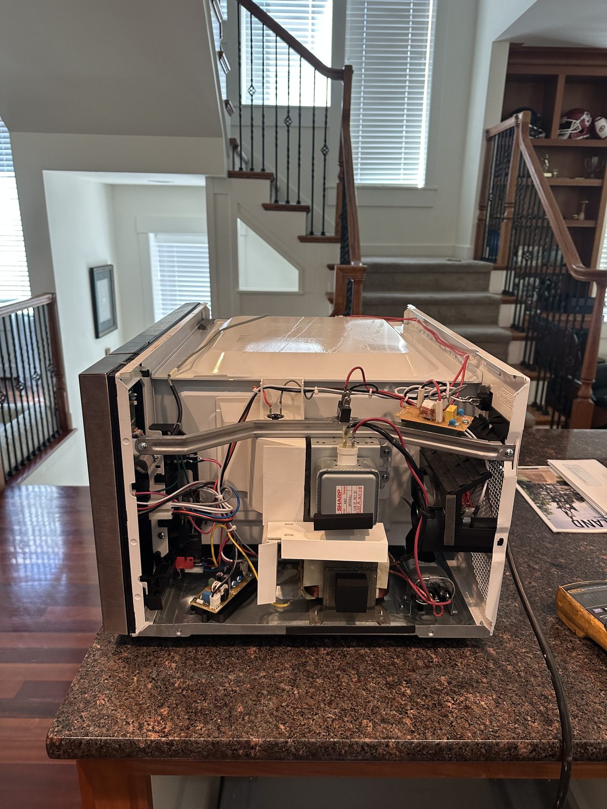 Viking built-in microwave repair, unit removed with magnetron and internal components exposed